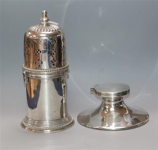 A George V silver lighthouse sugar caster, Chester, 1915 and a silver capstan inkwell.